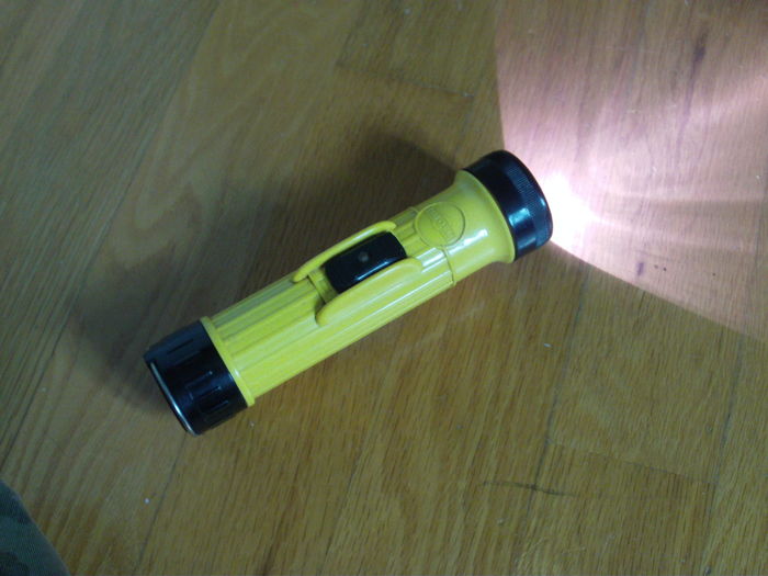Vintage Ray-O-Vac flashlight, ready for Irene!
This is one of the very last items I found in the original dumspter diving place I went to before it gets away. All it needs was fresh batteries, that's it! Even the original lamp was still working (and still does as of now!).

Its first real time test was during a uselessly produced blackout that happened sometime last year (in October I think). I think I already told the story about it somewhere here, I don't remember where though XD. Anyway... this was the flashlight that I had with me when looking around what was happening outside in the complete darkness, and I mean COMPLETE, like not a single light closer than a km away, aside from one heck of a row of car headlights and two firefighters trucks!

... just plain WEIRDO XD.

Well, since that night, I consider this flashlight to be reliable enough to serve during a power outage. And if something happens to it, I have three backup flashlights, no wait FOUR LOL.
Keywords: Misc_Fixtures