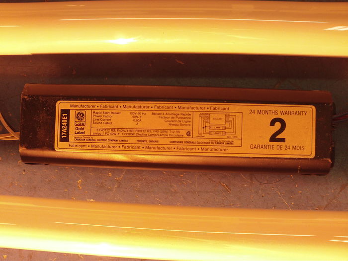 CGE 17A240E1 Gold Label
Here is a newer Gold Label ballast from March 1988, slightly different from [url=http://www.galleryoflights.org/mb/gallery/displayimage.php?pos=-963]this earlier model from 1983[/url]. It has been removed from a York troffer because of its odd model number. For some reason there's a 1 after the E. I've never seen something being added after the last letter of CGE's ballast model numbers.

That letter first indicated which sort of thermal protection came with the ballast. An N indicated a non-resetting thermal protection while an A indicated an automatic resetting protection. Those two suffixes have been used until the early 70s, by that time they were replaced by the T, which probably designated the thermal protection, non-resetting thermal protections having been likely phased out.

In the mid-late 70s, CGE created a separate line of non-OEM ballasts intended for sale as replacement ballasts. Those ballast were given the suffix W and had an extra warranty period, 6 months first, then 1 year in the 80s. [url=http://www.galleryoflights.org/mb/gallery/displayimage.php?pos=-5500]Here's an example of one (bottom ballast)[/url].

Then CGE redesigned their ballast labels, probably in the same time they introduced the framed CGE meatball logo. All the previous suffixes have been phased out and replaced by the E, which means the ballast doesn't contain any PCBs. It has been suggested the E would mean Ecologic, or Environment, this still has to be confirmed.

That pretty much what I know of those suffixes at the moment. The purpose of the 1 on the ballast pictured above is still unknown to me.
Keywords: Gear