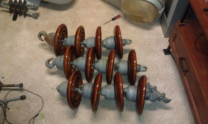 Three 4-chain disc suspension insulators = 12 disc suspension insulators.
These things were smaller than I thought. o.o There were a whole lot of these in the dumpster I got these from.

One of these has a small crack in it but I am okay.
Keywords: Miscellaneous