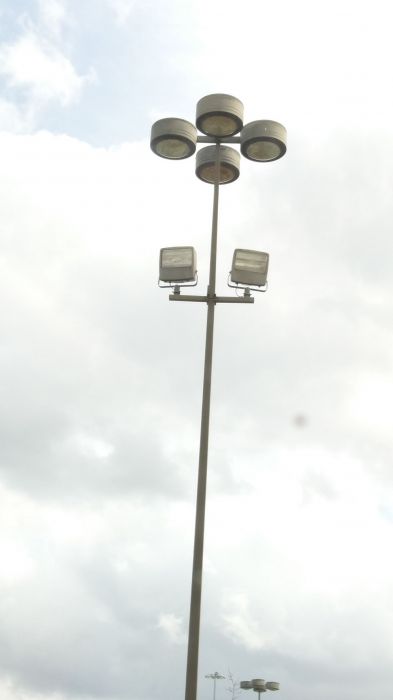 Unique circular metal halide parking lot lights with two flood lights
Very unique, I like this design. This is at a At Home parking lot.
Keywords: Misc_Fixtures