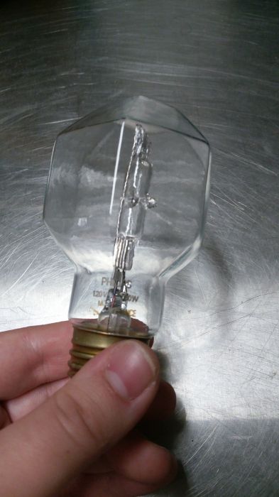 A very unique Phillips 60w halogen bulb. What a find!!!!!
What a very nice design on this bulb! Also found in the stash of light bulbs.
Keywords: Lamps