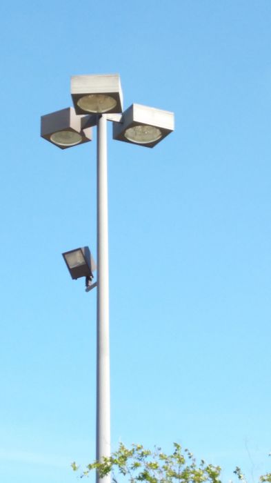 A set of mismatched parking lot lights
2 are 1000w and one is 400w. Weird. At a Lowe's parking lot, in Tomball, TX.
Keywords: Misc_Fixtures