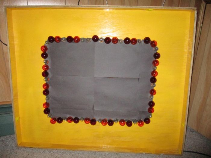 My Price is Right Light Border
I've remade my Price is Right light border.
Made of plywood, yellow paint, black construction paper, 4 patio light strings, red and orange G40 C9 bulbs, clear S6 indicator bulbs and a chase controller that they plug into.
See the video [url=https://www.youtube.com/watch?v=Z2xO8pO_eb0]here[/url]
Keywords: Lamps