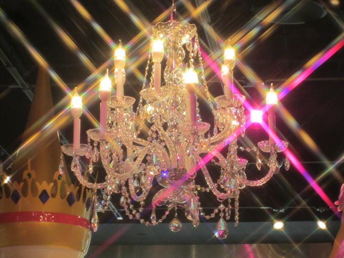 Chandelier @ Disney Store
With star effect - Note: the pink light is not part of the chandelier. That pink light is from another store light fixture in the background.
Keywords: Lamps
