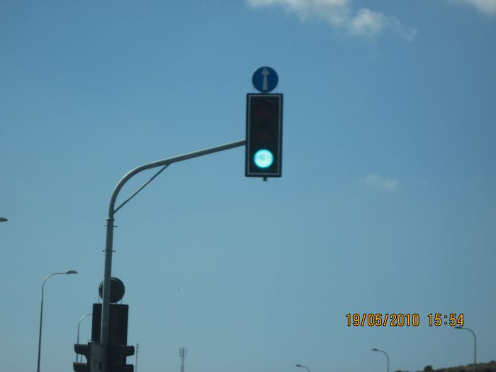 A LED traffic light
I don't think that Menora group is the manufacturer of the traffic lights in Israel. I think they only installs them and maintenance them. The traffic lights themselves (Incandescents and LEDs) are actually german made judjing by the connections of the companies in the Menora group that related to traffic lights with german traffic lights companies.
Keywords: Traffic_Lights