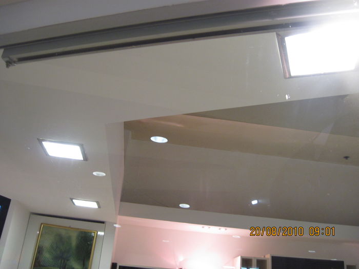 Square downlighters with two PL CFLs in "Castra" mall like center near "Canyon Haifa" mall.
I think the PL lamps are of the two pin lamps oprated by a preheat magnetic choke ballast (One ballast for two PL lamps).
Keywords: Indoor_Fixtures