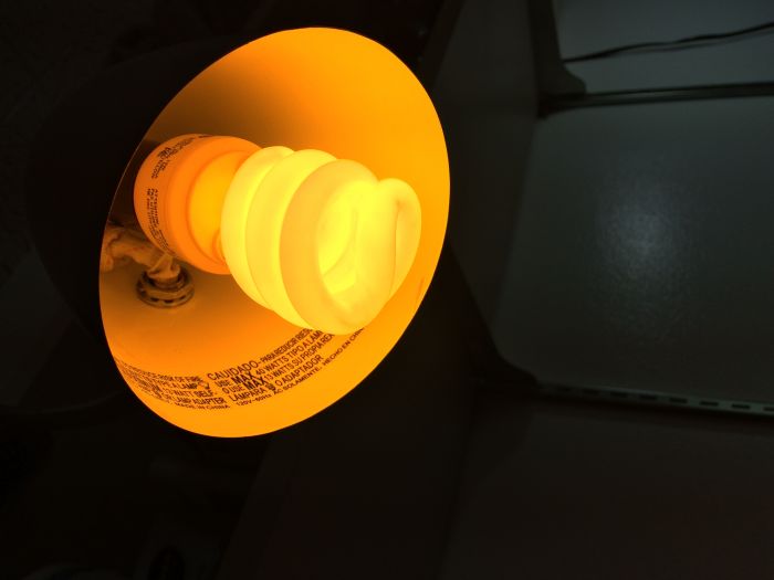 GE 13w Yellow CFL Lit
First start, a little mercury starved.  Picture is actually pretty accurate as to what it looks like in person.  I may use this as a bug light, it's about that same color. 
Keywords: Lamps