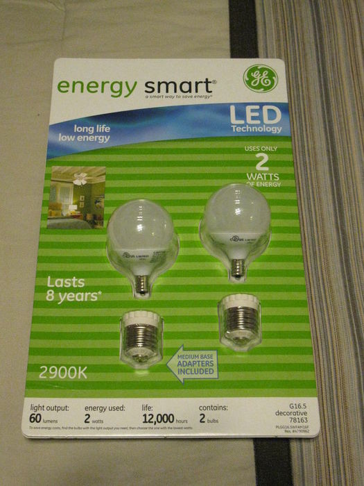 GE LED G16.5
These are my GE energy smart LED bulbs. They are 2watts each and are 120volt. As you can see they are globs (G16.5) and have a candelabra (E12) base. They did come with there own medium base adapters. I got these at SAM's club. They look like they have only one LED in them and the LED has a diffuser over it (from what I can see). 
Keywords: Lamps