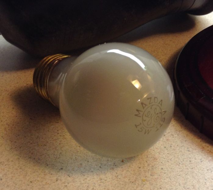 Ge Mazda 15 Watt
Yard sale find, came out of an old photographic screw in safelight fixture, an inside etched Mazda 15 watt bulb by GE. May be made in the 1930's or early 1940's. One of my oldest bulbs.
Keywords: Lamps