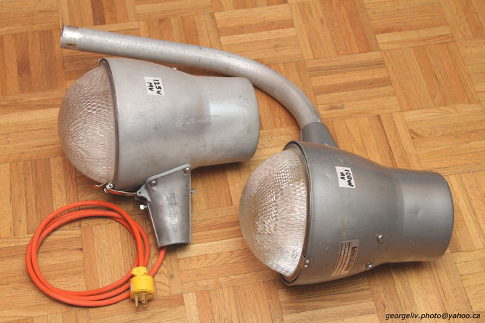A pair of McGraw-Edison 125w mercury street lights
Found on ebay from the Oshawa, Ontario area, found at a yard sale. Both were 125 watt mercury vapor street lights. One had a burned ballast and I converted it to 100w MV. I was told these were found in a small town about 30 miles north of Oshawa called Cresswell. Definitely Canadian as clearly marked on the label. The ebayer never wired or tested them and eventually simply listed them on ebay. Each had an EYE HF125PD lamp, which appeared like new. About 8" in diameter and 12" tall. Quite compact.

Additional info from Encyclopedia of Chicago  2005 Chicago Historical Society.
http://www.encyclopedia.chicagohistory.org/pages/2766.html

McGraw-Edison Co. 
Max McGraw started an electrical-contracting business around 1900, when he was still a teenager in Iowa. In 1926, McGraw moved to Chicago, purchased a toaster company, and set up an electrical appliance business, the McGraw Electric Co. By the mid-1950s, the company had over 1,000 workers in the Chicago area. In 1957, McGraw bought Thomas A. Edison Inc. and formed McGraw-Edison Co., a maker of appliances, tools, and electrical equipment. By the mid-1960s, annual sales topped $450 million, and the company had about 20,000 workers at plants around the country. In the mid-1970s, sales passed $1 billion, and the company had about 2,200 employees in the Chicago area. In 1985, McGraw-Edison was purchased by Cooper Industries of Houston, Texas.
Keywords: American_Streetlights