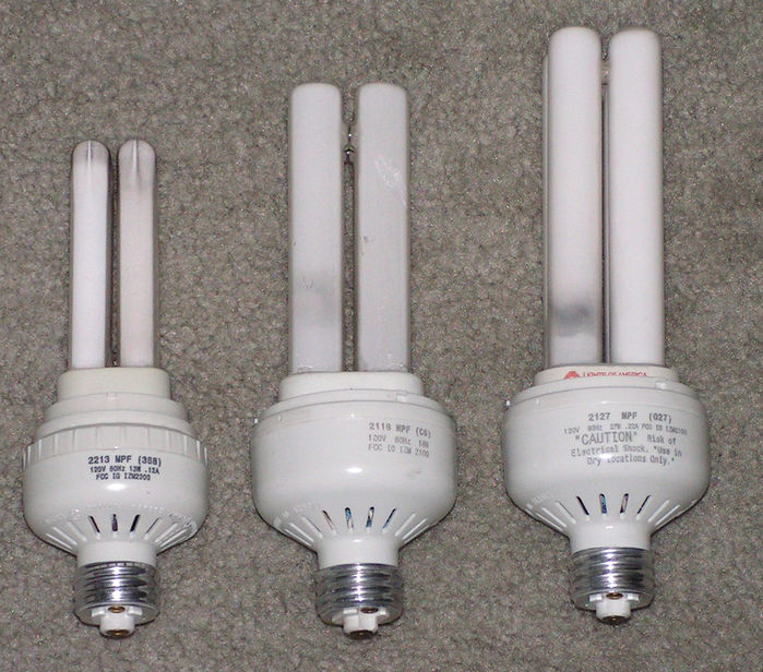 Lights of America Quad-Lites
The three wattages of LOA "Q-Lites" with electronic ballasts and replaceable lamps: 13w, 18w, and 27w. The 13w lamps are basically PL lamps made by GE, Philips or Sylvania, but rebased for LOA with four pins and no guide pin. The larger lamps are made by Panasonic and are also rebased 4-pins with no guide pin. The lamps are hard to remove and the ballasts tend to have short life and also kill the lamps quickly due to instant-starting and underpowering them.
Keywords: Lamps