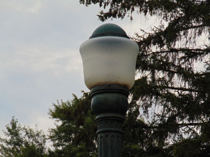 Large Westinghouse Murphy Globe 300 Watt incandscent
Same residence on Payne Ave.  These were the predominant luminaire in the Cities of Buffalo and Lackawanna as well as the Tonawandas before being replaced by MV/HPS over the years.  The dome was originally bare aluminum.
Keywords: American_Streetlights