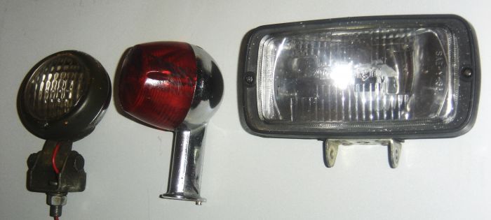 Three Diffrent Automobile Lamp Fixtures
well there lights.....from Motor Vehicles....i know one is from a Motorcycle...the other Two could be from a Car or Something Else.
The One on the Left Side of the Picture didn't have any Marking's indicating Brand...but it has a Glass Lense and Metal Body.
The One in the Middle is a Yamaha branded Lamp...Automatically i assume that would be from a Yamaha Motorcycle....it has a Plastic Lense with a Metal Body.
The one to the Right is an Interlight Branded Lamp....Plastic Body Glass Lense.
Keywords: Misc_Fixtures