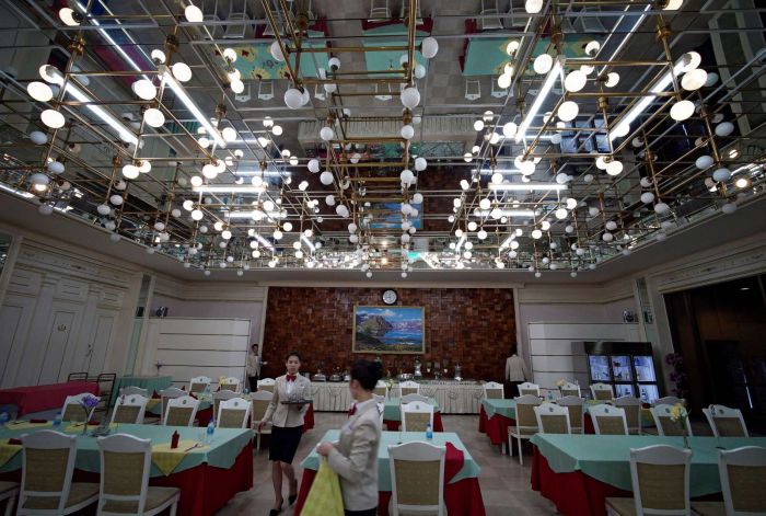 North Korea - Restaurant Lighting
Found in this album on the Internet: [url=https://www.msn.com/en-us/news/world/life-in-north-korea-what-you-are-allowed-to-see/ss-BBFQ6Qb]Life in North Korea: What you are allowed to see[/url]
Keywords: Misc_Fixtures