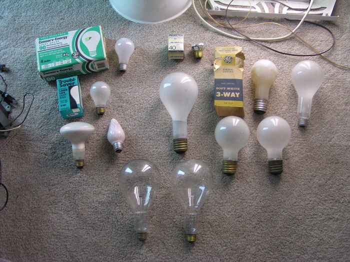 Lots of classic bulbs found on Thursday, Nov 3rd!
All were found at Habitat for Humanity except the two at the top left (green 4 pack and little Abco spotlight, which were bought at a little hardware store). From top left to right:

Feit Electric Conserv-Energy 90w bulbs made by Sylvania in USA, 1994.
ABCO R-14 clear spot made in Japan, 70s
GE 100-200-300w 3 way, early 70s, Canada made
Sylvania Electric 200w PS-30 inside frost, 1953
Troubl-Saver 60w bulb made in Hungary, c. 1975-1977
GE Mazda 300w mogul base, 1930s
Two GE Mazda 100-200-300w 3 ways, 1930s
GE 75w R30 flood, 1953 (single coil C11 filament)
GE 25w F15 pink, late 60s
Westy Mazda 300w clear bulb, 1934
GE Mazda 300w clear bulb, 1934
Keywords: Lamps