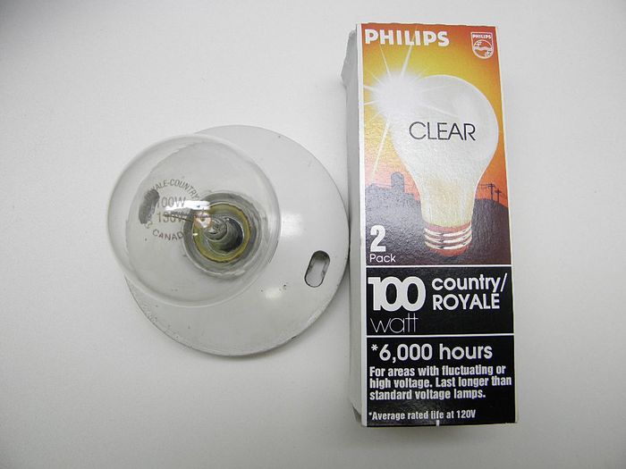 Philips 100w Country/Royale 
Here's a pack of Philips 100w Country/Royale lamps. Interestingly the pack calls them Country-Royale while the etch calls them Royale-Country. 
Keywords: Lamps
