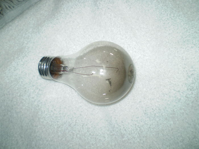 Detective Work For You!
This Ace Hardware 100 Watts Clear light bulb burned out yesterday.  I want you to do a bit of detective work on this burned out bulb and see what you can find how it die.
Keywords: Lamps