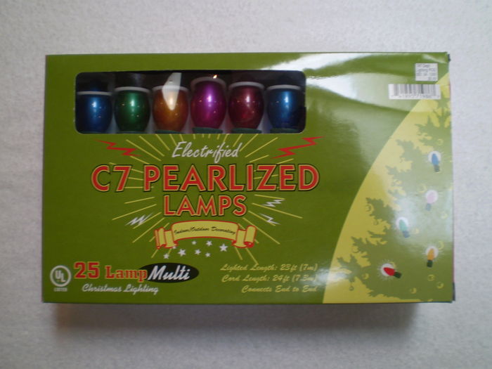 C7 Pearlized Lamps
Electrified C7 Pearlized Lamps Indoor/Outdoor Decorating 25 Lamp Christmas Lighting.

Fabrication Date: 2003 (Package), July 2003 (Sticker at the String), and "TS" (Base of the Bulbs)
Fabrication Location: China
Voltage: 120 Volts
Keywords: Misc_Fixtures