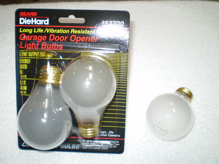 Sears DieHard Garage Door Opener Light Bulb
Sears DieHard Long Life /Vibration Resistant Garage Door Opener Light Bulb.

Here I found at Sears at Johnson Ferry Shopping Center, Marietta, GA yesterday (2010-8-14).  It was former K-mart store when Sears acquired that store.  After the takeover, there were no light bulb aisle except only couple of hanging blister pack of these bulb at the tools area.

There is stamp at the base stating: PLC 55W 120V CHINA K9 (3/4 of Circle)

Base: [Medium] (one-inch) Edison Screw (E26) (Brass)
Bulb Shape: A19 Short Neck
Filament: Coiled Wreath with 9 Support
Lumens: 360 Lumens
Voltage: 120 Volts
Life: 4000 Hours
Fabrication Date: K9 (Stamp at the Base)
Fabrication Location: China
Keywords: Lamps