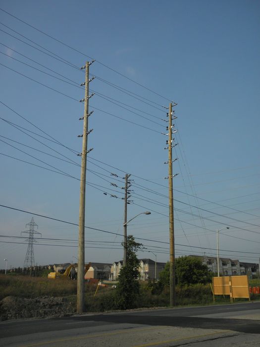 Tall Utilty Poles
Here's a better pic showing how much taller the new utility poles are compared to the old ones. 
Keywords: Miscellaneous