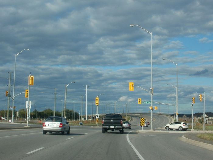 Cooper OVXs 
Here's a shot of a bunch of OVXs with pretty tall poles that seems to be the norm in Peel Region.  I recall these were 400w HPS but I'm not sure about that. 
Keywords: American_Streetlights