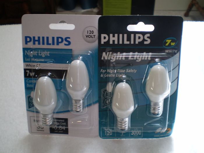 Philips White 7 Watts Night Light
Here I picked this up from Marietta Home Cheapo today (2011-9-10) with both new and old package.  Both have two different bar code on the package for the same type of bulb.

Tell me which one is most misleading label.  You can vote at [url=http://www.galleryoflights.org/mb/index.php?topic=622.0]rjluna2's Philip White 7 Watts Night Light: Vote Here[/url].

Fabrication Location: China
Energy Used: US$0.84 based on 3hrs/day with US$0.11 per kWh (Left)
Keywords: Lamps