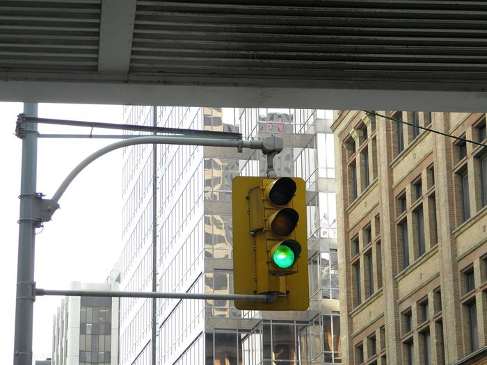 [Gone] The Last 8-8-8 in Toronto
Here's what I believe to be the last 8-8-8 traffic signal left in Toronto, there are two other 8-8-8s left but they either have 3M adapters on it or louvers. This one is for pretty busy crosswalk downtown and is still incandescent along with the rest of the signals at this crosswalk. Note the slight browning on the green lens since this signal defaults to green. 

This signal was removed and replaced with a Fortran traffic poly 12-8-8 and the other signals retrofitted to LED sometime around early February 2012, it was one of the last 8-8-8s in Toronto... 
Keywords: Traffic_Lights