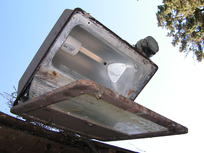 Seen better days...
Mount a light where people can easily reach it, and it becomes a target for vandals...
Keywords: Misc_Fixtures
