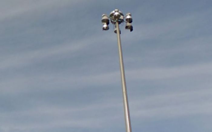 Painted Paraboloic Highmast Fixture?
First time I have seen, new highmast poles with two of the fixtures looking painted the same beige colour as the pole!
Location: Freeway 427 and Derry Rd.
Photo Credit: google
Keywords: American_Streetlights