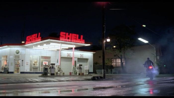 Robocop (1987) 0:49:50
Old school gas station. All lit by fluorescent lights even the pole mounted fluoros that are still around but usually dead. Bucket light is incandescent. All those lights and gas station is no longer there as it was blown up. :(

Man I would love to see this thing in real life!
Keywords: Lights_Camera_Action