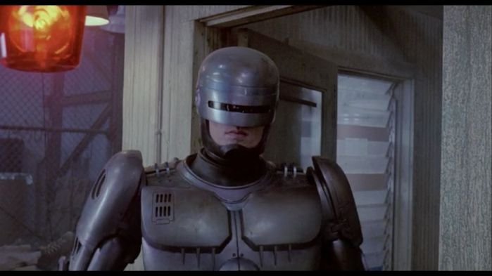 Robocop (1987) 1:06:17
Robocop himself next to an unknown red beacon light. At the drug factory where Murphy found out the drug lord worked for OCP.
Keywords: Lights_Camera_Action