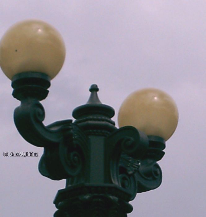 Streetlight #071 - Old 2-Lamp MV (closeup)
I took a general [url=http://www.galleryoflights.org/mb/gallery/displayimage.php?pos=-12184] picture of one of these last year - #012 [/url] when I was downtown in the city.

Was there earlier this year, and  I got a good close-up of one :) ...

Location: 
Denver, CO - Civic Center Park.

Keywords: American_Streetlights