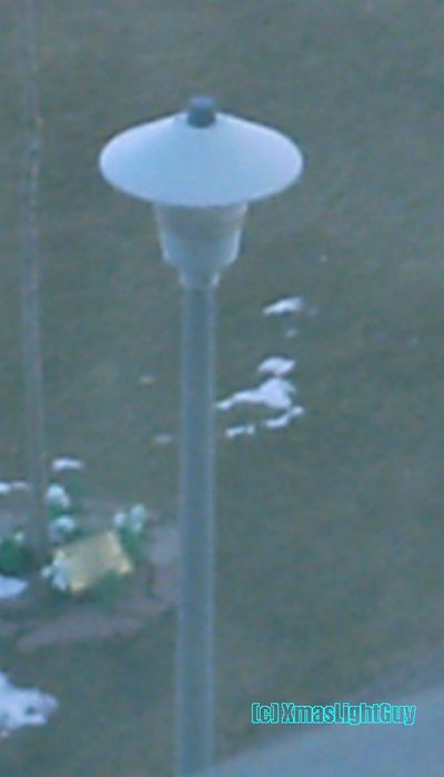 StreetLight #131 - Don't Get This View Too Often...
A common streetlight...as viewed from above :)
(image taken through a window / in the shade .. quality isn't the best) 

Location: 
Near Denver Art Museum

Keywords: American_Streetlights