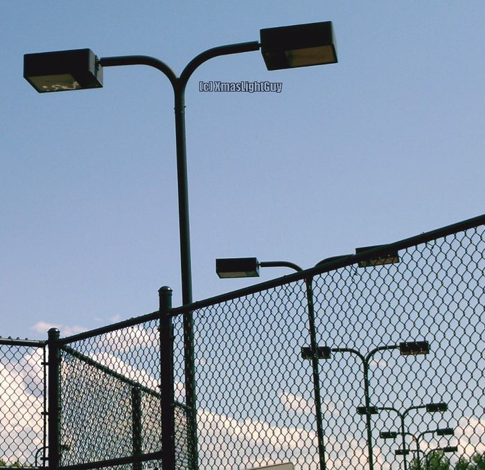 StreetLight #143
Shoebox-type lights for tennis courts at a park

Location:
Bible Park, Denver CO
Keywords: American_Streetlights
