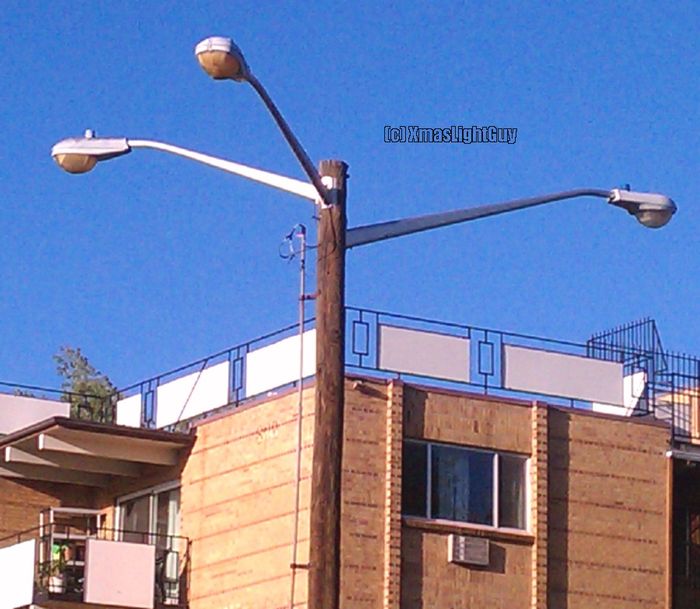 StreetLight #180 - 3 On A Pole @ Different Heights
Parking lot light at an apartment building (atleast thats what I assume it is since I only saw it from the side)
3 lanterns mounted in a pole but not at the same height.
I wonder if that one on the right was added later since it doesn't match? (didn't even notice that til tonight when uploading the pic)


Location: 
Littleton, CO
Keywords: American_Streetlights