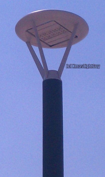 StreetLight #236
Flying-Saucer looking LED light. 
I'm pretty sure there were MH lights in this spot originally...I'll have to look & see if by chance I have a pic of the originals.


Location:
Mineral light-rail station, Littleton, CO
Keywords: American_Streetlights
