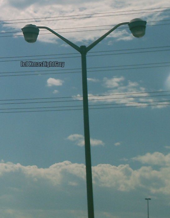 StreetLight #244
Some sort of bucket lights? Haven't seen one like this before, but they are neat looking old lights.
Image was taken through a window from a moving train, so quality isn't the best...


Location:
Somewhere along the RTD commuter-train 'B' line, Denver, CO
Keywords: American_Streetlights