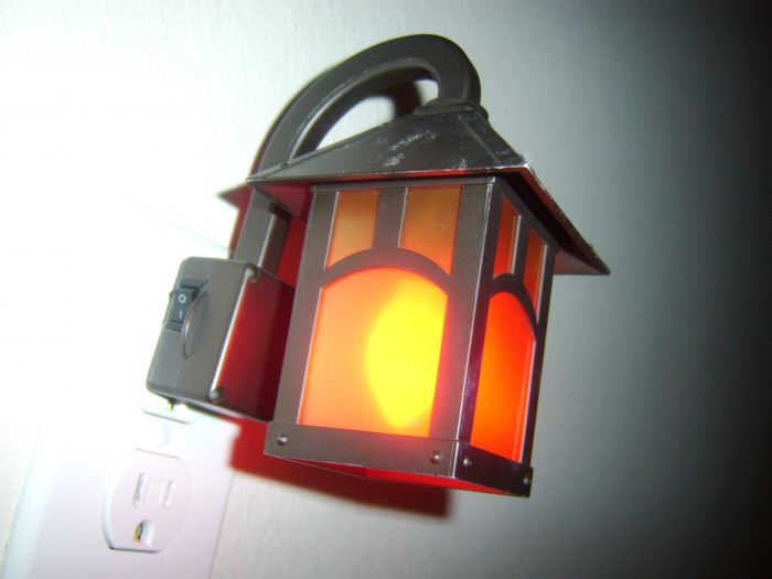 THE RED NIGHT LIGHT STRIKES AGAIN!!!!!
Now its in my old night light! XD 

It kind of looks good with a red bulb in there.
Keywords: Light_Humor!