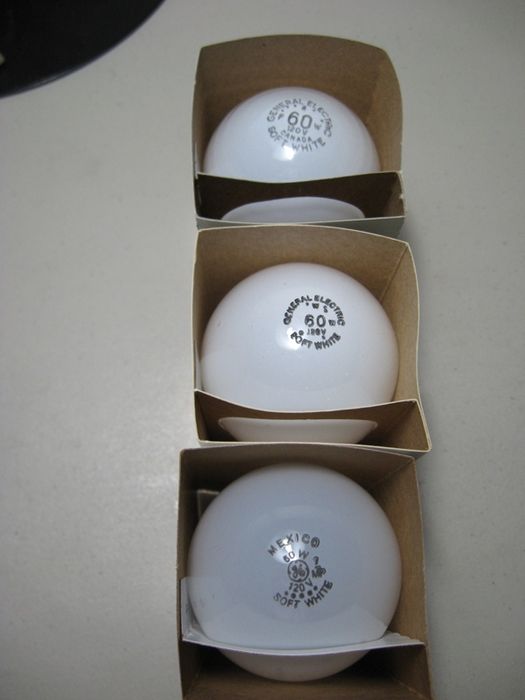 GE 60 watt Soft White incandescants
Three GE 60 watt Soft White bulbs with different countries of origin. 
Keywords: Lamps