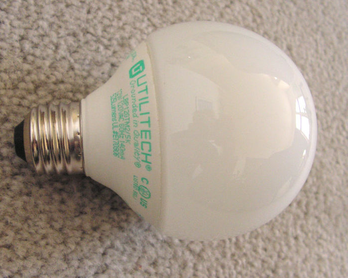 Utilitech G25 5000K CFL
I really hope I don't regret buying these. I just swapped out two Feit Electric and two GE G25 globe CFLs of 2700K that are about 8 years old that still worked fine (but have dimmed somewhat) - they had rapid-start triple-tube internals. These are, of course, instant-start spirals with amalgams (so start very dimly), but I really wanted 5000K lamps in my windowless bathroom (hey, it's cheaper than building in a skylight) to match the other bathroom that has 32w T8 SPX50's. Well, these have lower CRI than the linears but they still do look quite nice. Will they last 10 years, though? We'll see! (you gotta love the slogan, "Grounded in Quality").
Keywords: Lamps