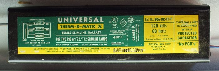 Universal 2x Slimline Ballast 806-BR-TC-P
A Universal 'Thero-O-Matic-X' ballast for 6-8 Foot slimline lamps.
(The Green/Yellow label version)

This is what's in the [url=http://www.galleryoflights.org/mb/gallery/displayimage.php?pos=-19168] 6-foot slimline fixtures [/url] I got at an estate sale.
Kinda weird seeing one of these good old Universal's  in new/perfect condition.

Keywords: Gear