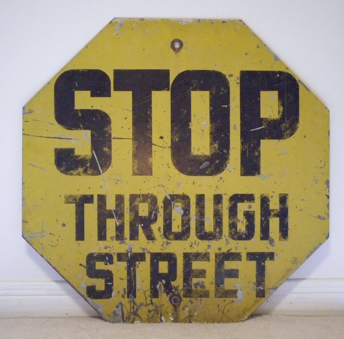 Yellow Stop Sign
Old style yellow stop sign that very hard to find on the streets now but they were used before the current red one was introduced in the 50s. Sign is painted non reflective steel. [url=http://i560.photobucket.com/albums/ss50/joseph_125ON/My%20Collection/9f0e020c.jpg]Click here[/url] for the maker's logo. 
Keywords: Miscellaneous