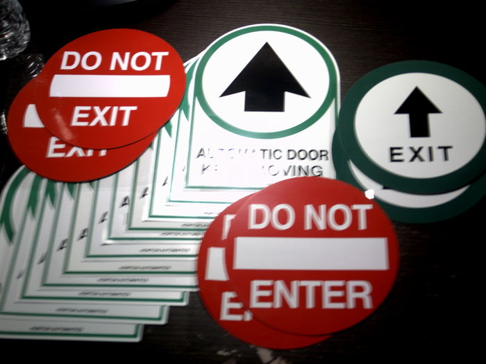 Whoa! Look it All those Decals! O_O
Wasn't expecting this many! I only asked for six, two copies of three different kinds. There are two decals that have an arrow on the stickey side and "DO NOT ENTER" on the back (bottom), two with an arrow and "ENTER" on the stickey side and "DO NOT EXIT" on the back (top left), two that say "DO NOT ENTER" on the sticeky side and have an arrow with "EXIT" on the front, five that have an arrow and "AUTOMATIC DOOR KEEP MOVING" on both sides, and six that have an arrow and say "AUTOMATIC DOOR KEEP MOVING" on the front and "DO NOT ENTER- STAND CLEAR- AUTOMATIC DOOR CAN SWING OPEN AT ANY TIME" on the stickey side. Only the ghost shaped ones are Horton Automatic decals. 

Unfortunatly, i didn't get any decals that have an arrow and say "AUTOMATIC DOOR KEEP MOVING" on the front and "DO NOT ENTER ONE-WAY AUTOMATIC DOOR" on the stickey side, but i clearly can't complain since i got all these extra decals for free! I put one copy of each tag on a clear sheet as to mimic a glass surface so the sticky side can be viewed.
Keywords: Miscellaneous