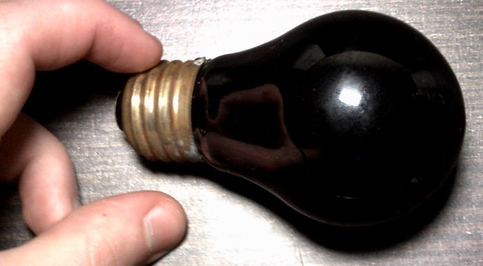 Ancient Red Lamp.
Not sure of the age, but looking at the filament, maybe 1930s? See the lit pic for the filament. I think this os NAICO branded and it's 120V 125V according to the etch and it looks really dim when it's lit. Very little useable light.
Keywords: Lamps