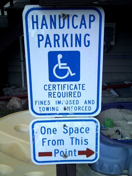 Handicapped Parking sign #1
This one came from my other grandfather. He owns an appartment and rents it out to people. This sign came with a "One Space From This Point" adder. BTW, anyone ever heard of AHS???
Keywords: Miscellaneous