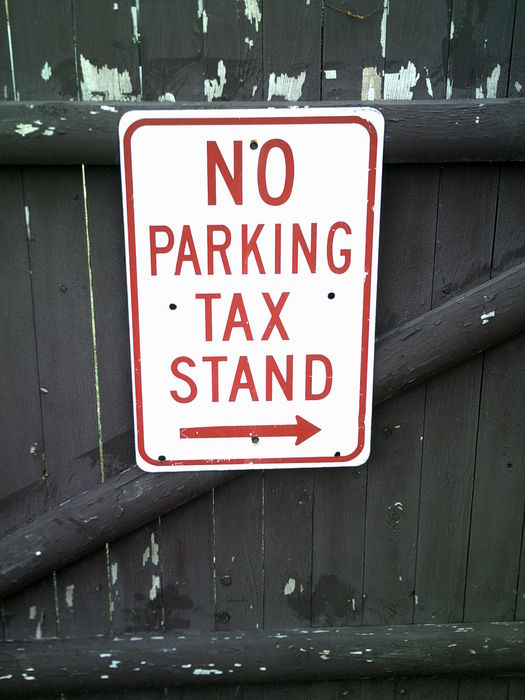 No Parking TAXI stand sign.
I don't know who thought this was funny, but about a year ago I noticed some screwball ripped off the "I" thinking it was some sort of joke. :roll: Well, the way the government is taxing us, they might as well set up madiory "tax stands" lol. I wonder where I can get red vynal letters or a sheet to cut out a new "I" for this...
Keywords: Miscellaneous