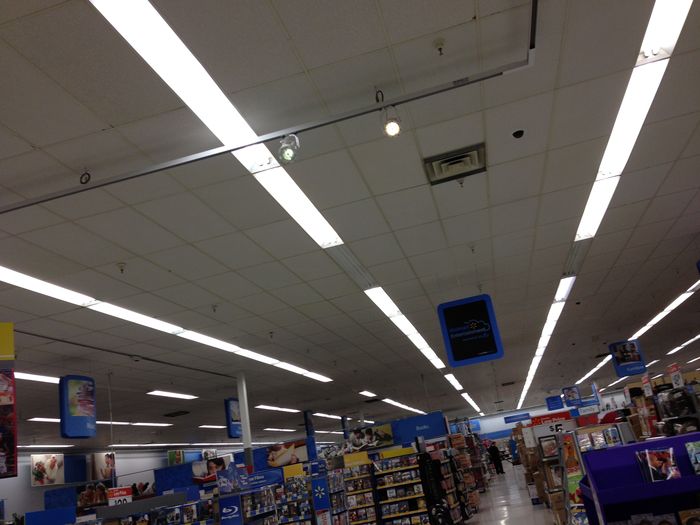 cree track lighting going green/dim
at this wal-mart store in the camera department, take a look at the spotlight on the left. dim and green you see. i have seen lots of these acting like that. $120 a pop, prolly a waste. yep these fluorescent lights are T12 but lots of dead ballasts. they still relamp them though.
Keywords: American_Streetlights