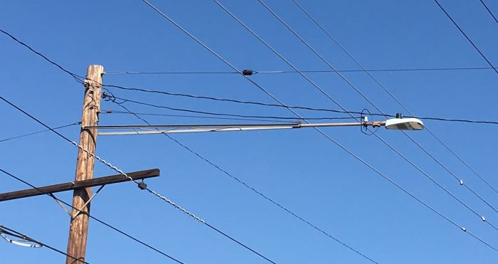 Old 1950s Calectric arm now infected with a GE Evolve ERL1 LED
Southern California Edison is swapping out HPS with GE LED ERL1s in the area (around Fontana, CA). Man those things are ugly.
Keywords: American_Streetlights