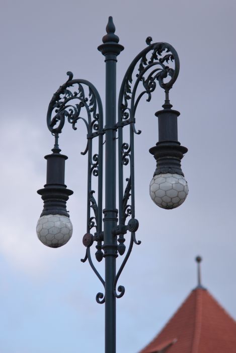 Lanterns for the old city
There are several kinds of them (this style) in Prague.
AFAIK, these have HPS lamps inside and could be like 20 years old...?
Keywords: European_Streetlights