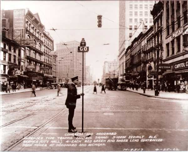 First 3 Color Traffic Signal
This is first ever 3 color traffic signal, placed in service in 1920.  It was designed by Police Superintendant William Potts of Detroit.  It used three 200 watt 220v bulbs and railroad lenses.  Obviously it displayed red on the top and green on the bottom on one street, and green on the top and red on the bottom on the cross street.  Potts is credited with designing the first 4-way traffic signal.)

(Prior to the Detroit signal a 2 color signal system was designed by Salt Lake City policeman Lester Wire but I'm not aware of any photos of it.)
Keywords: Traffic_Lights